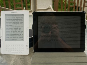 the iPad and Kindle Side by Side Outside the iPad and Kindle Outside